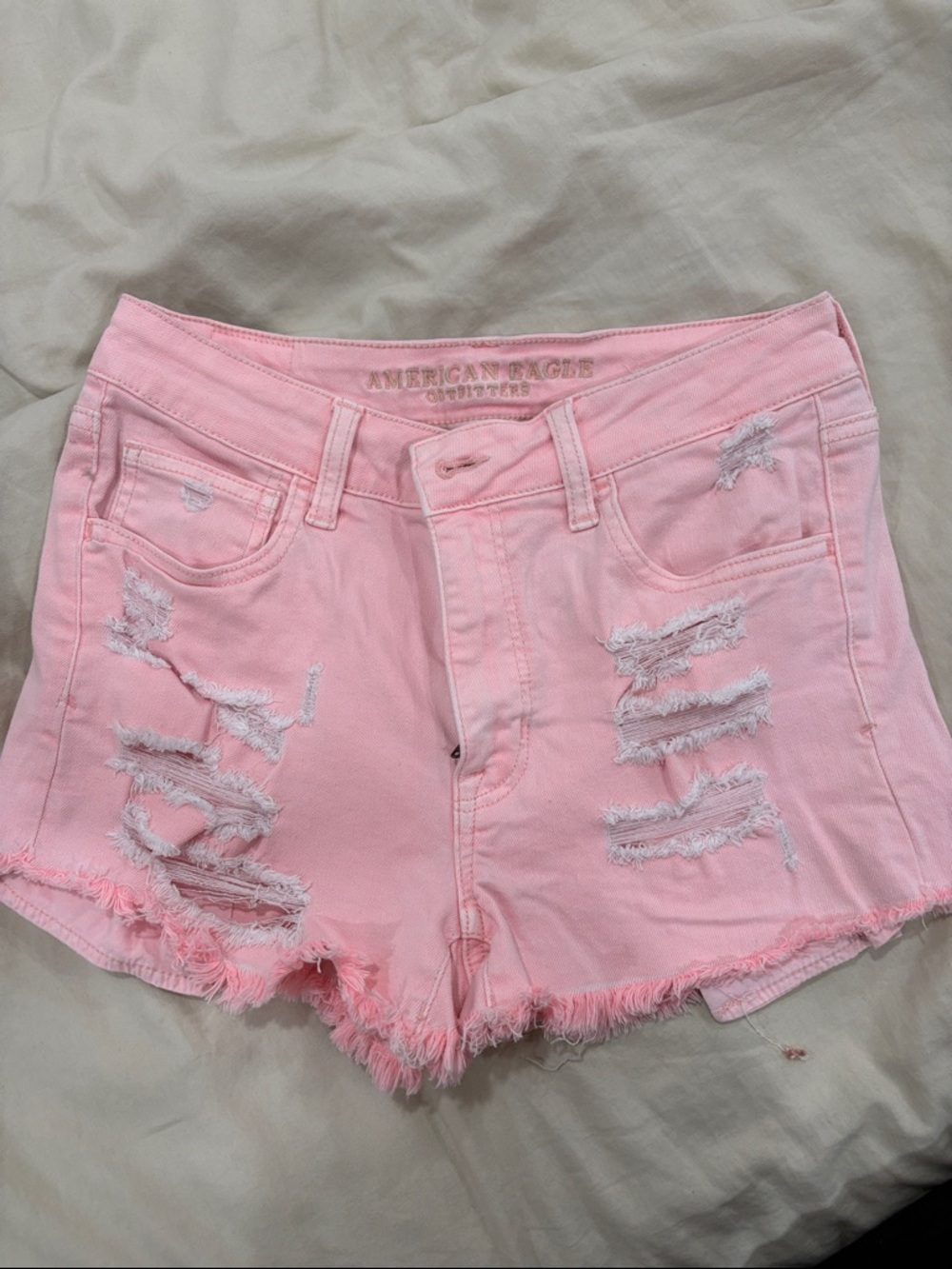 American Eagle Outfitters Light Pink Distressed Denim Shorts